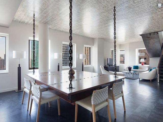 <p>A dining area in the five-bedroom penthouse duplex in CASSA NY CONDOMINIUMS, at 70 West 45th St., listed by Prudential Douglas Elliman for $35,000 a month.</p>
