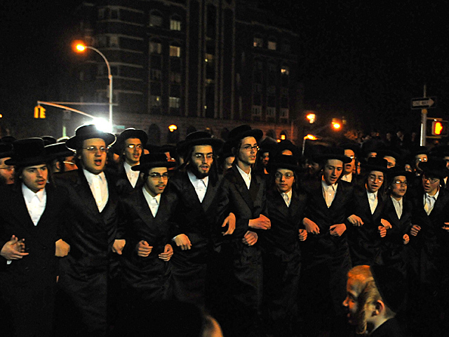 <p>After the wedding thousands of Satmar Hasidic Jews celebrated along Bedford Avenue, Oct. 17, 2012.</p>
