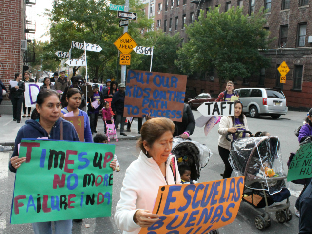 <p>District 9 families marching.</p>
