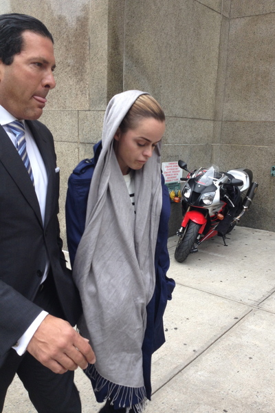<p>Actress Taryn Manning leaves Manhattan Criminal Court October 12, 2012 with her lawyer Joe Tacopina after being arraigned on misdemeanor assault charges. The 33-year-old allegedly punched, kicked and scratched her pal and assistant during an early morning tussle in their hotel.</p>
