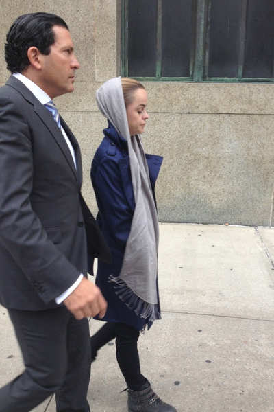 <p>Actress Taryn Manning leaves Manhattan Criminal Court October 12, 2012 with her lawyer Joe Tacopina after being arraigned on misdemeanor assault charges. The 33-year-old allegedly punched, kicked and scratched her pal and makeup artist during an early morning tussle in their hotel.</p>
