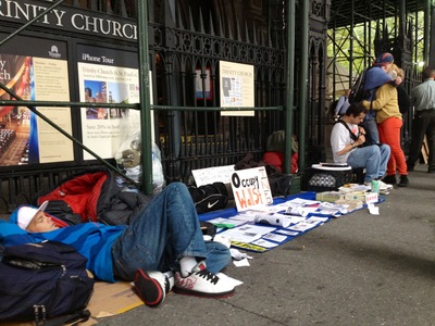 <p>People on the sidewalk outside Trinity Church on Monday, Oct. 15, 2012.</p>
