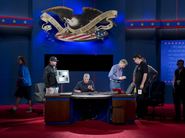 <p>Crews put finishing touches on the stage for the vice presidential debate at the Norton Center at Centre College in Danville, Ky., October 10, 2012.</p>
