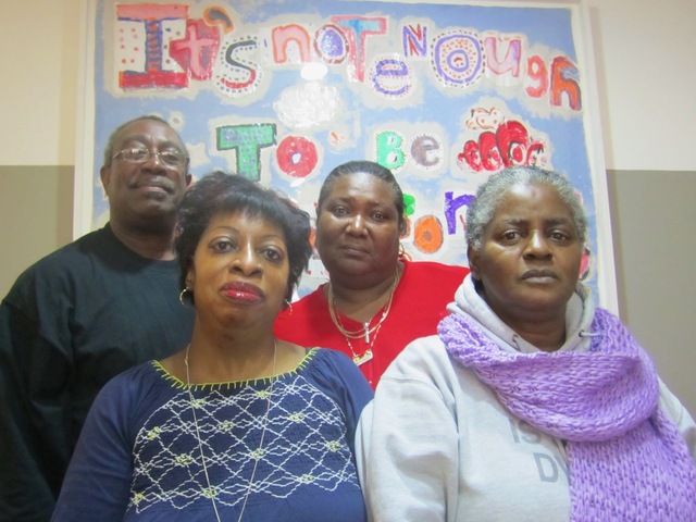 <p>Residence manager Wayman Young, residence coordinator Sheila Hanley (back right), health services coordinator Deborah Moore (front left) and resident Valida Henry said Nov. 15, 2012 they missed their friends at Bailey-Holt House, which closed after Hurricane Sandy because of extensive damage.</p>
