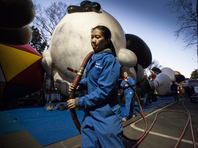 <p>Members of the Macy's technicians inflate balloons ready for the annual Thanksgiving Day Parade on Nov. 22nd, 2012.</p>
