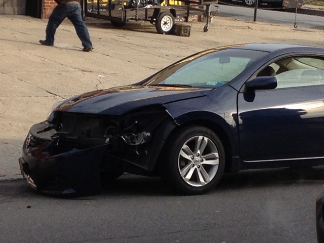 <p>A black car rear ended a bus carrying special needs students neat Metropolitan Ave. and Mt. Olivet Crescent on Tuesday November 28, 2012.&nbsp;</p>
