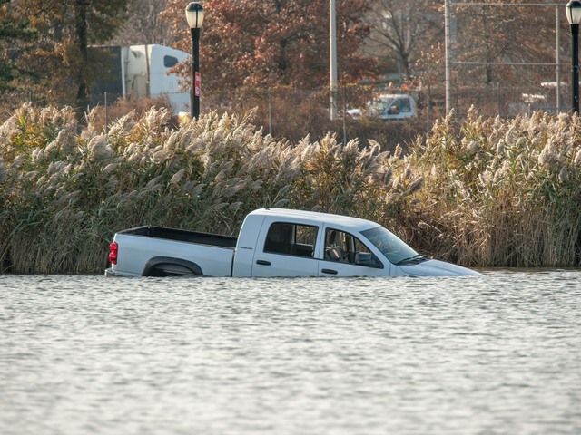 <p>A gleaming Dodge Ram 2500 pickup truck with temporary tags from Texas was found in Meadow Lake in Flushing Meadows Corona Park Monday morning, Nov. 19, 2012.</p>
