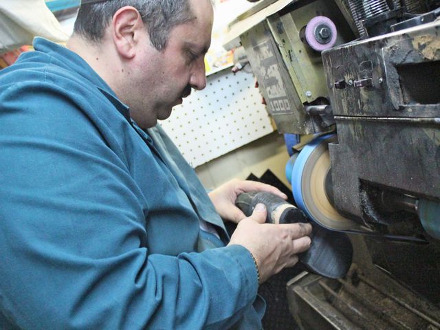 <p>Erik Koynoe, from Erik Shoe Repair on Grand Street, is a third-generation cobbler.</p>
