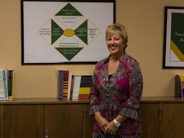 New Dorp High School principal Deirdre DeAngelis has helped turn around the once-struggling school by focusing on developing students' writing skills.