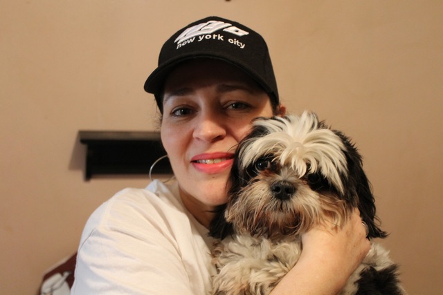 <p>Maria Vazquez after being reunited with her stolen dog, Skylar.</p>
