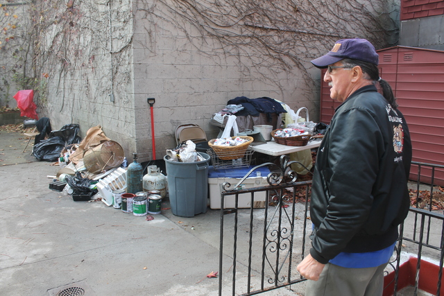 <p>Army veteran Eddie Acosta, 66, surveys the garbage he hauled from VFW Post 5195 in Red Hook, which sustained serious flooding during Hurricane Sandy.</p>
