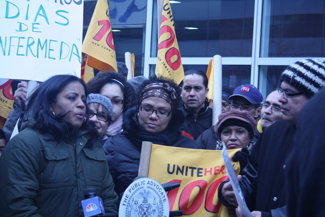 <p>Cafeteria worker Emily Ponce gives a rally cry during a demonstration about docked sick days on Nov. 24, 2012</p>
