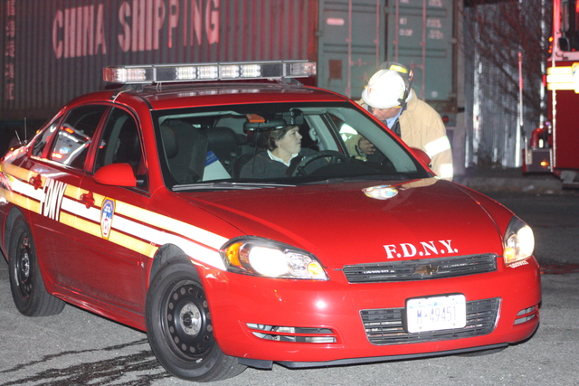 <p>Emergency responders at the scene where a Con Ed worker was burned in an explosion at 55-30 46th St. in Queens Nov. 26, 2012.</p>
