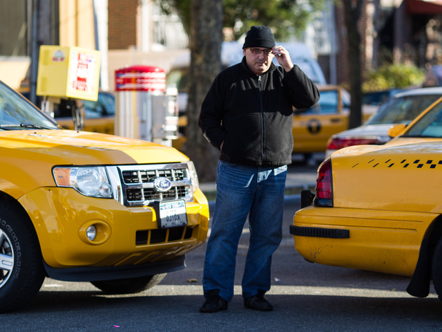 <p>A gas attendant oversees re-fueling for yellow cabs only at the Shell gas station in Jackson Heights, Queens on Nov. 9, 2012.</p>
