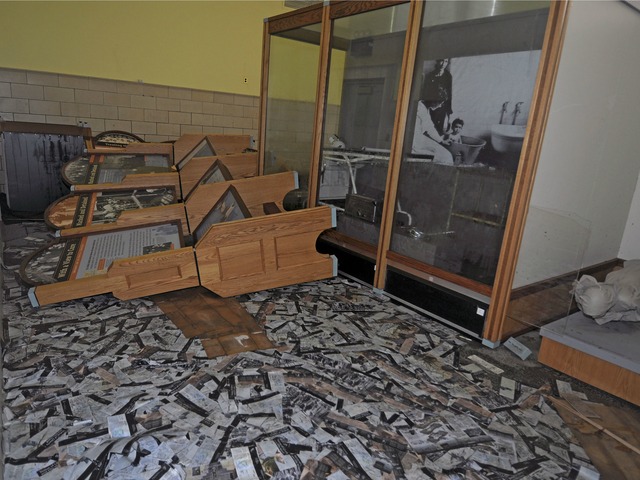 <p>Brochures and cases in a health exhibit on Ellis Island were strewn about in the storm.</p>
