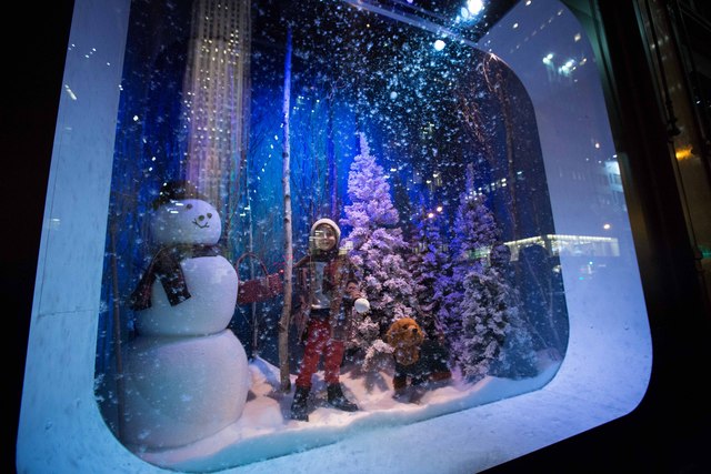 <p>The snow theme on one of Saks' windows on Fifth Avenue</p>

