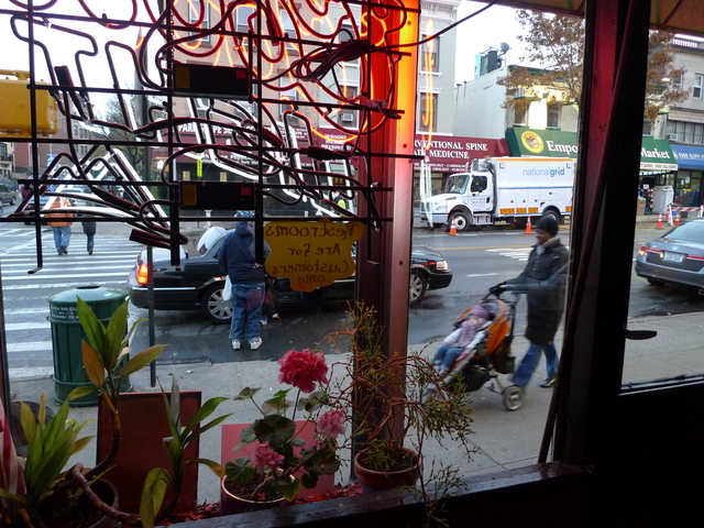 <p>The view from the front window at Jackie's Fifth Amendment on Fifth Avenue and Seventh Street in Park Slope. There's been a bar on that corner, under different owners, for 75 years, the bartender said.</p>
