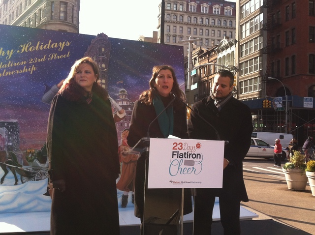 <p>Flatiron/23rd Street Partnership Executive Director Jennifer Brown, at center, talks about some of the holiday events that begin Dec. 1, 2012.</p>

