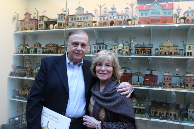 <p>Jerry and Nina Greene in front of their collection of toy trains and stations at the New York Historical Society Museum.&nbsp;</p>
