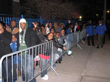 The rapper handed out turkeys to families at P.S. 45 Clarence Witherspoon