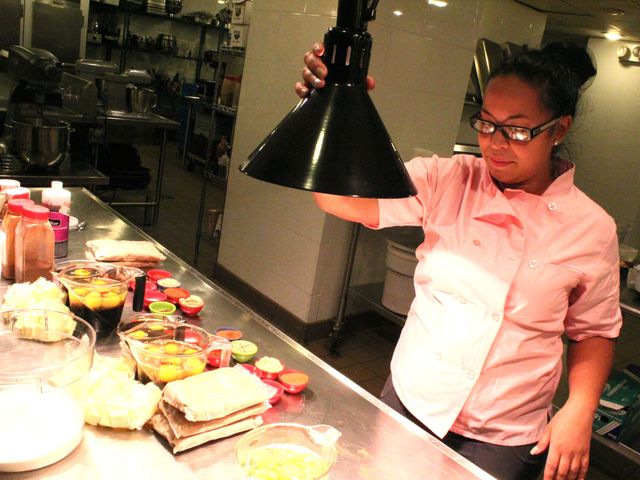 <p>Valerie Galindo gets ready to bake at Astor Center, which loaned its kitchen to the Lower Eastside Girls Club after its own was destroyed by Hurricane Sandy.</p>
