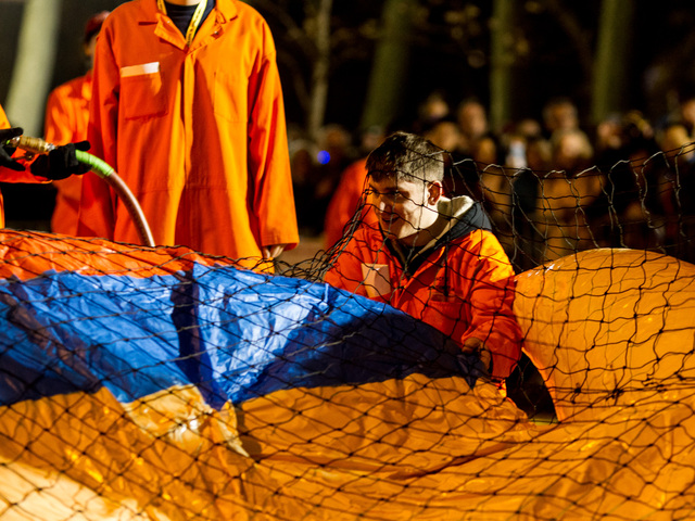 <p>A Macy's balloon technician inflates a balloon on the eve of the Thanksgiving Day Parade.</p>
