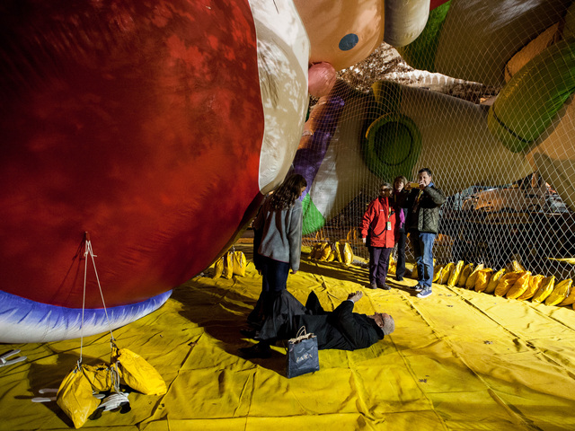 <p>Les Steiger, 57, from New York City captures a kodak moment of his family at the Macy's balloon blow-up event on Nov. 21st, 2012.</p>
