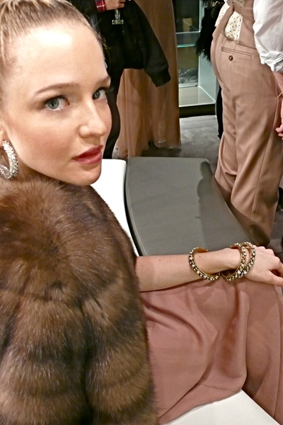 <p>Blush silk chiffon gown and long sable jacket.</p>
