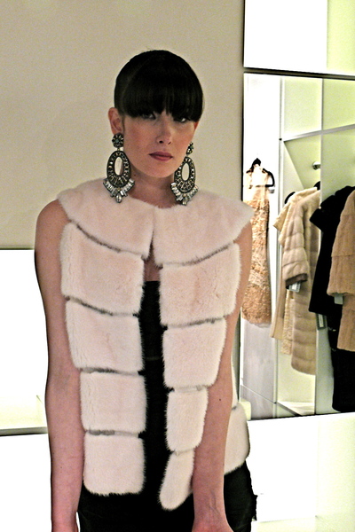 <p>White mink vest with silk organza panels.</p>
