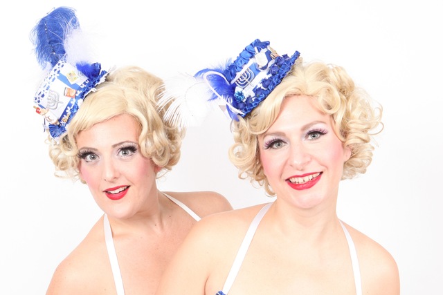 <p>The Schlep Sisters created the Menorah Horah.</p>
