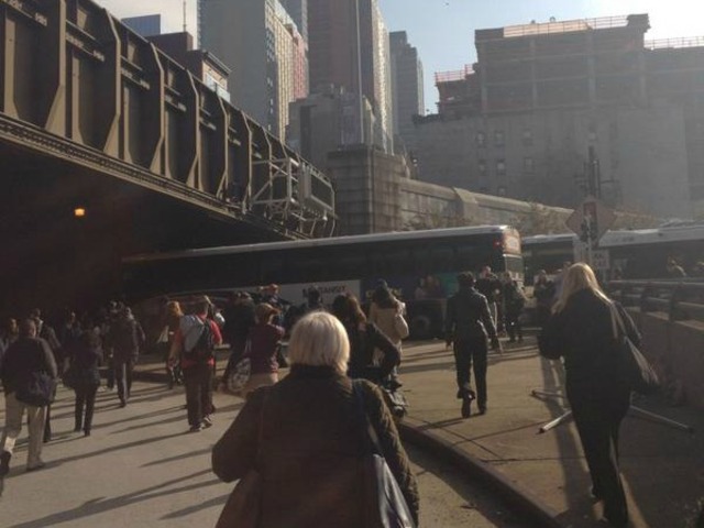 <p>A bus crash injured roughly 20 and created hours-long traffic delays prompting some commuters to walk their way to work through the Lincoln Tunnel on Monday November 12, 2012.&nbsp;</p>
