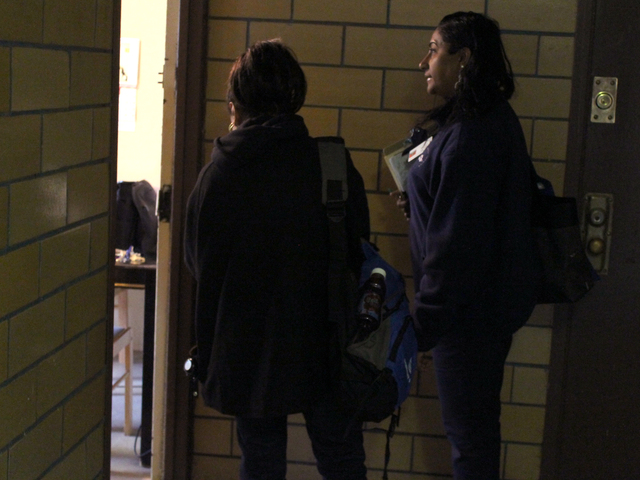 <p>A NYCHA family service worker and nurse Margaret Humphrey spoke to a resident of the Red Hook Houses Tuesday, Nov. 13, 2012. The agency sent hundreds of workers and volunteers into the houses, which went more than two weeks without power, heat or hot water.</p>
