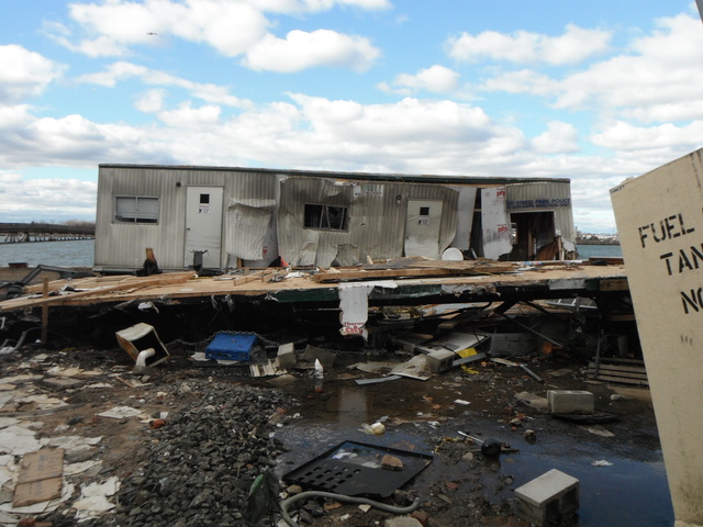 <p>A trailer housing parks police offices was shredded and uprooted by Sandy.</p>
