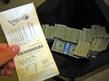 Thirteen jurors pooled their bets to pick up a piece of the $588 Powerball prize money.