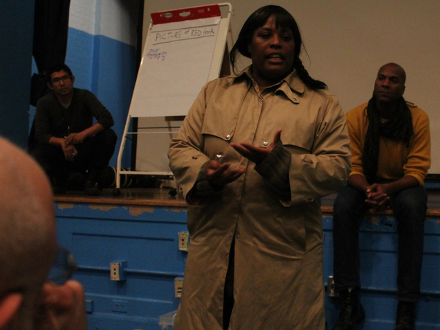 <p>Thousands of Red Hook Houses residents are still without heat or hot water, including the woman pictured here. 'There&rsquo;s still much more that we have to achieve,' she told attendees of the Red Hook community meeting Wednesday night, Nov. 14, 2012.</p>
