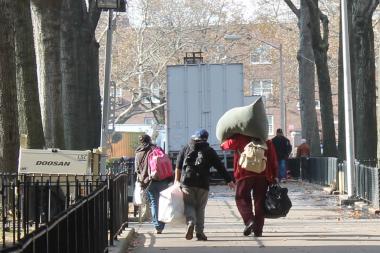 Lights flickered to life and contractors prepared to restore heat and hot water to parts of Brooklyn's largest public housing complex Monday morning, but thousands still remain without power since Hurricane Sandy flooded much of Red Hook and battered New York City Oct. 29.
