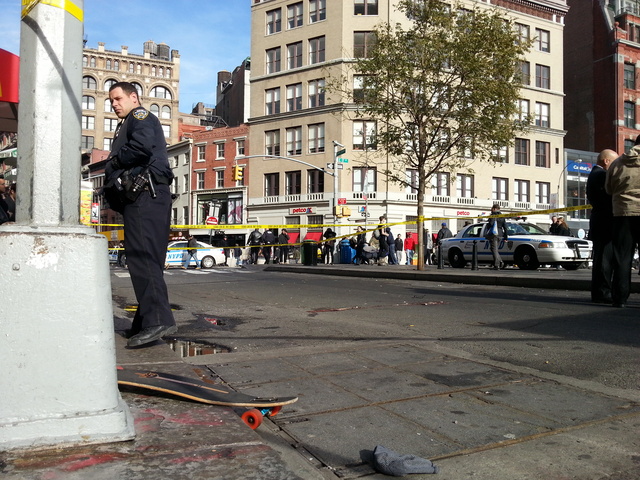 <p>A man riding a skateboard was struck by a truck and critically injured on Broadway near Union Square Tuesday afternoon, Nov. 20, 2012. The man's skateboard is visible at left, near the base of the light post.</p>
