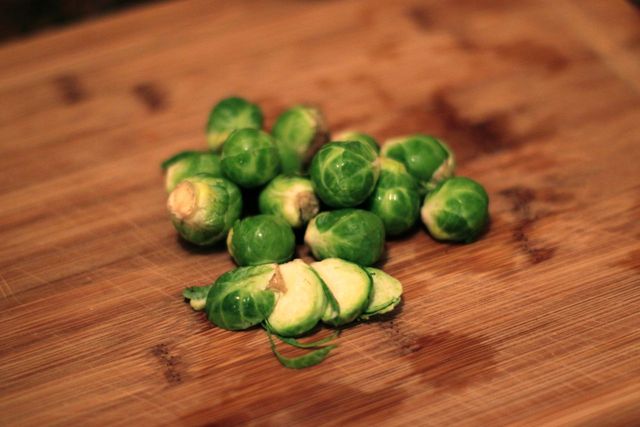 <p>Slice the Brussels sprouts three or four times each lengthwise to allow them to brown in the oven.</p>
