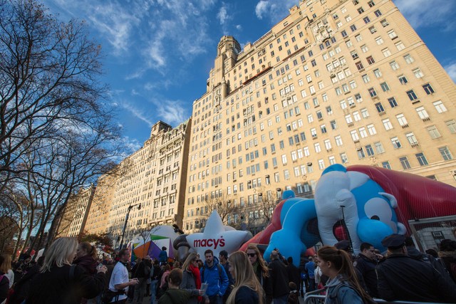 <p>A Smurf balloon filled with air during the Macy's Thanksgiving Day Parade balloon inflation Nov. 21, 2012.</p>
