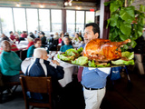 Thanksgiving Arrives Early for Uptown Neighbors  