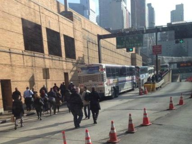 <p>A bus crash injured roughly 20 and created hours-long traffic delays prompting some commuters to walk their way to work through the Lincoln Tunnel on Monday November 12, 2012.&nbsp;</p>
