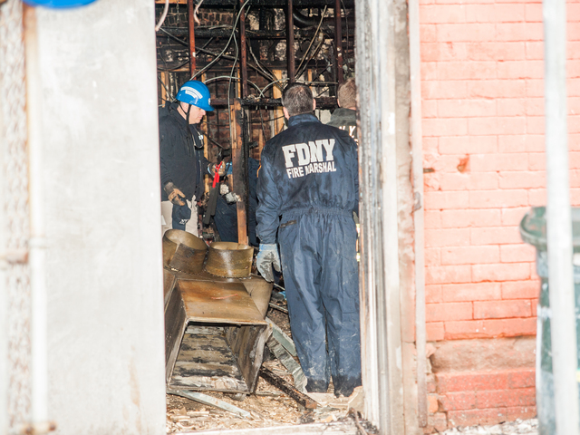 <p>Investigators concentrate their search at the rear of the Deli on Monday November 12th, 2012.</p>
