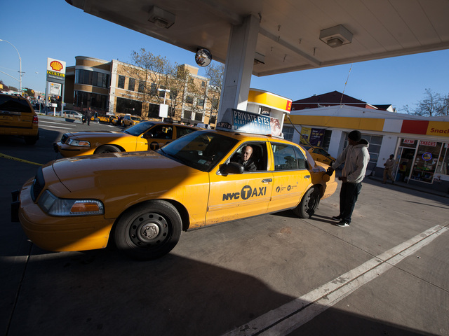 <p>A yellow cab gets re-fueled at the Shell gas station in Jackson Heights, Queens on Nov. 9, 2012.</p>
