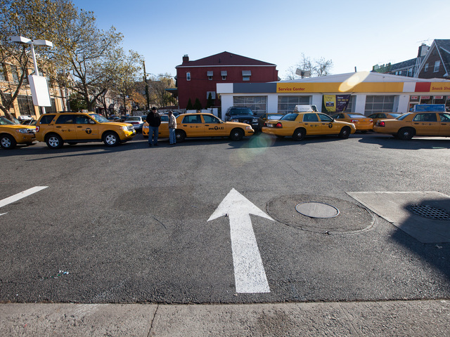 <p>Yellow cabs line up for fuel at the Shell gas station in Queens on Nov. 9, 2012.</p>
