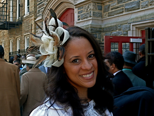 <p>Michelle R. in a rich trimmed fascinator with plumesAbyssinian Baptist Church in Harlem.</p>

