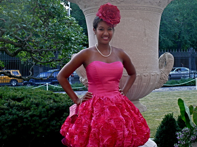 <p>Festive, dramatic vivid fuchsia, rose patterned puff dress on Frick member Allison M. Ecung at the Frick Garden Party.</p>
