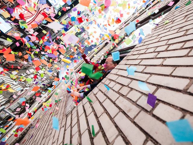 <p>Allison Hagendorf and Tim Tompkins throw confetti over Times Square during the annual Airworthiness Test on Dec. 29th, 2012.</p>
