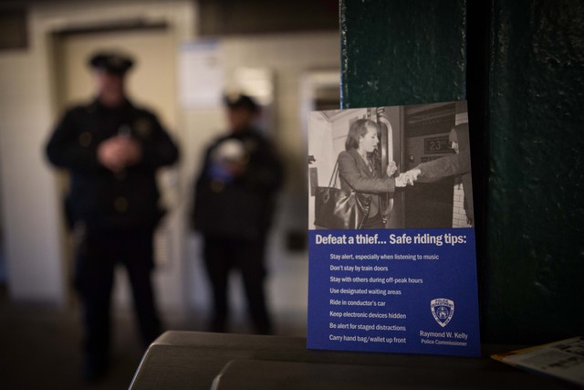 <p>Officers handed leaflets on subway safety to commuters at 40th Street station Friday morning, Dec. 28, 2012. The night before, a man was shoved to his death in front of an oncoming 7 train as it pulled into the station.</p>
