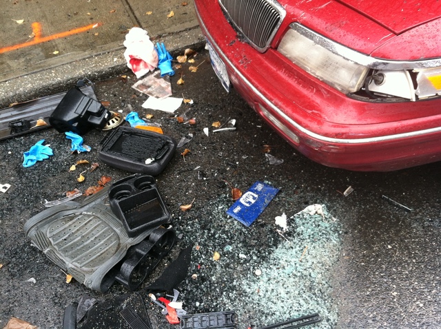 <p>Piles of debris from a car crash at the scene of Quentin Road and West 5th Street in Brooklyn on Dec. 8.</p>
