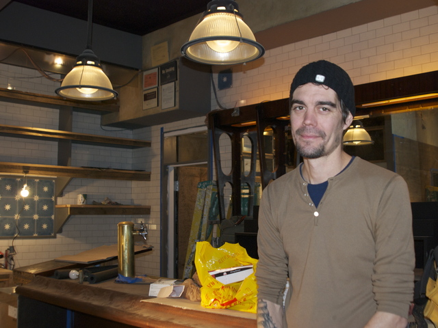 <p>Co-owner Jason Connolly, 38, stands in his soon-to-be-reopened Seaport bar and cafe Fresh Salt on Tuesday, Dec. 18, 2012.</p>
